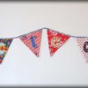 Cleo-Bunting-with-Metalic-Symbols